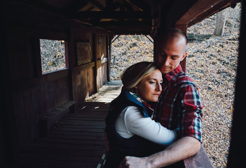 cozy couple hugging and happy on a bridge, happy hug 4k