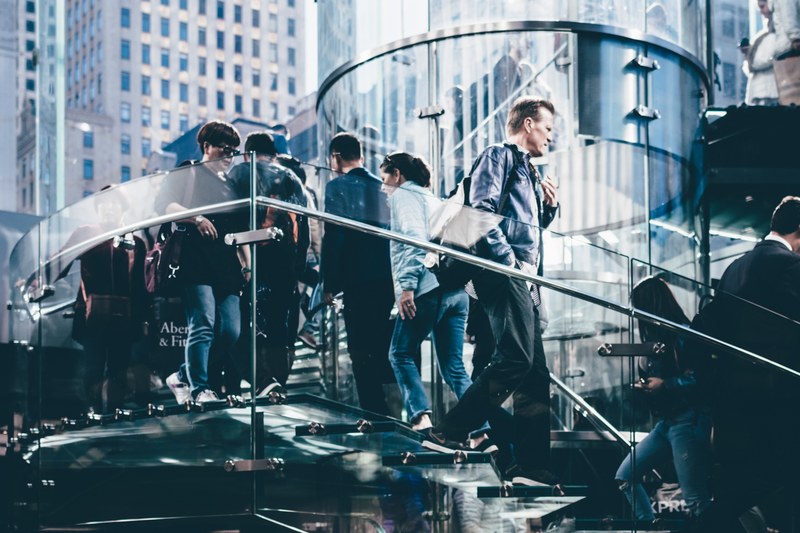 people on a glass staircase in an apple store, apple store staircase 4k