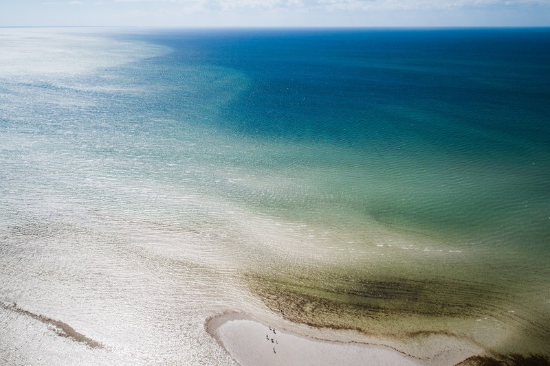 drone aerial view of the shallow waters near a sand beach at orleans orleans massachusetts united states, shallow waters drone view 4k