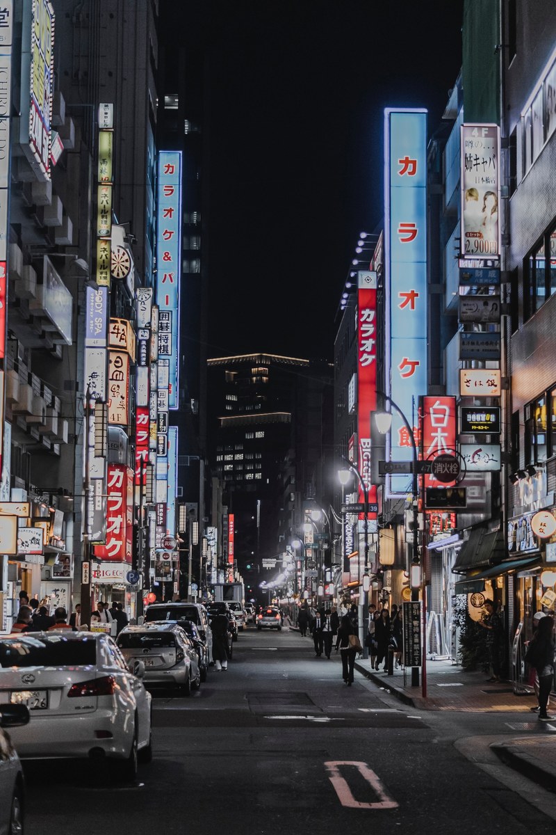 bright neons and advertisements in the streets of shibuya tokyo, night life 4k