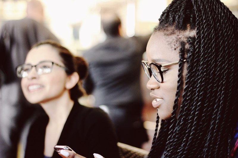 an african american girl with braids and glasses next to an asian girl with braids, _with my tribe 4k