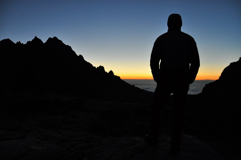 silhouette of person looking at ocean during sunset, person looking at ocean during sunset 4k