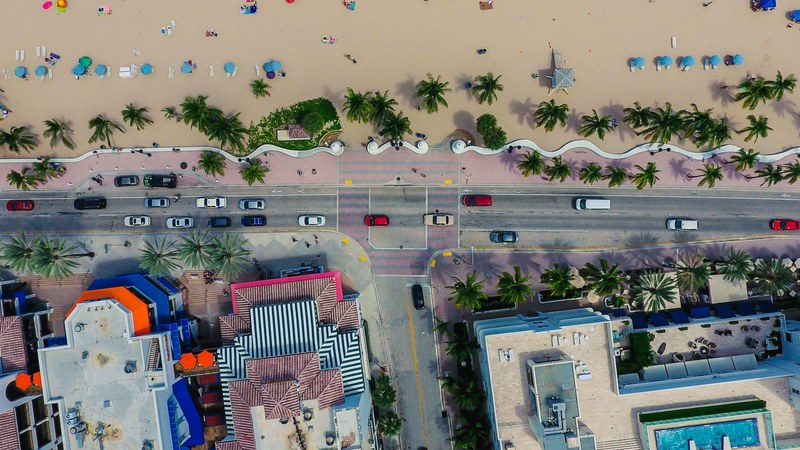drone view of the busy street by the sand beach in east fort lauderdale fort lauderdale florida, ftl for the land 4k