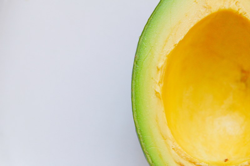 the corner of a hollowed out avocado, avo break 4k