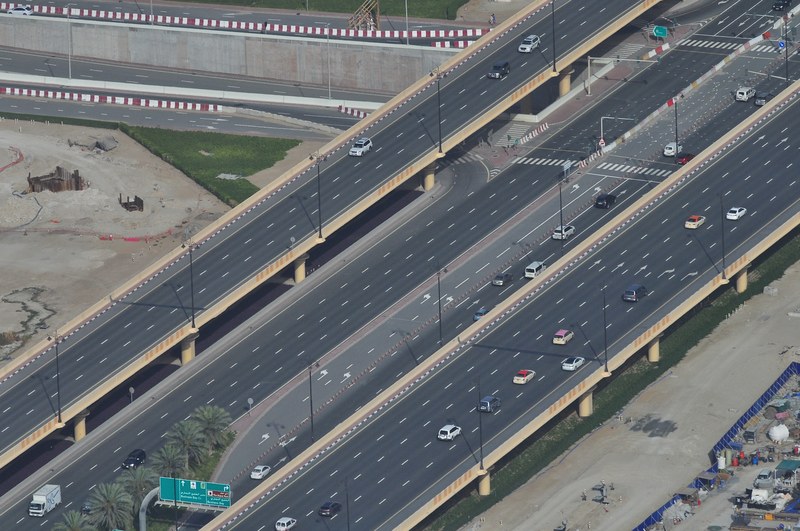 an aerial shot of cars on a multi lane freeway, top view of a freeway 4k