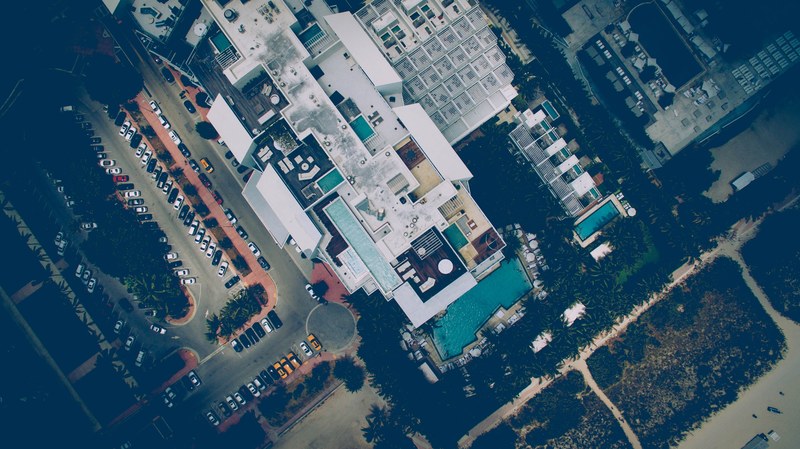 drone aerial view on a hotel terraces with rooftop pools in miami beach, drone view of hotel terraces in miami beach 4k