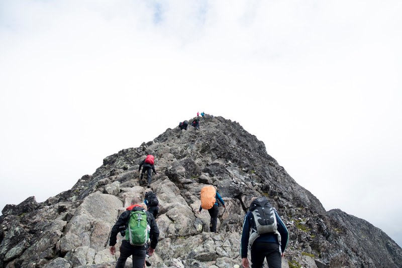 hikers with backpacks summiting peaks of mountain, hikers at peak 4k