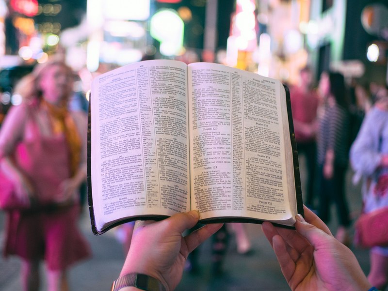 bible open book hands and page 4k