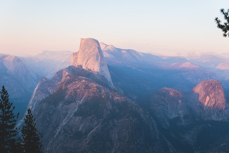 a high view of the granite cliffs in yosemite valley, unbelievable view of half dome 4k