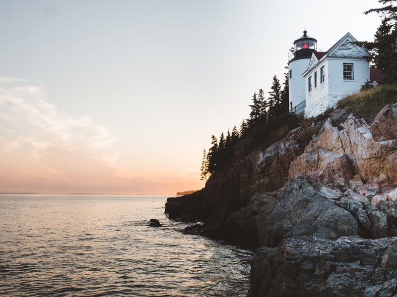 rock ocean lighthouse and shoreline 4k