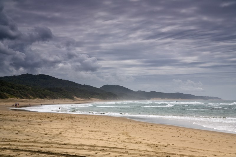 coastline stormy waters ocean shore and mountains forge a beautiful beach view, _beach around the coastline 4k