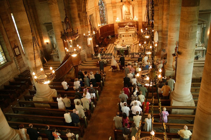 overhead of church wedding ceremony with columns and candle lights, church ceremony from overhead 4k