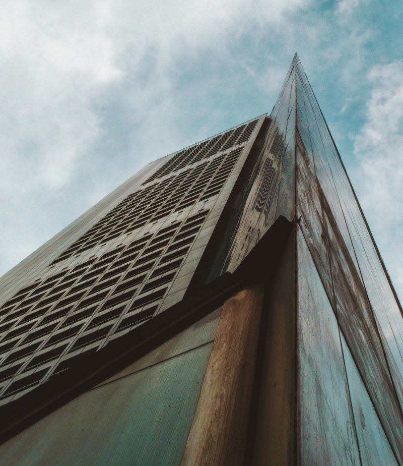 sharp edge architectural forms on a buildin edifice in singapore, sharp cornered building 4k