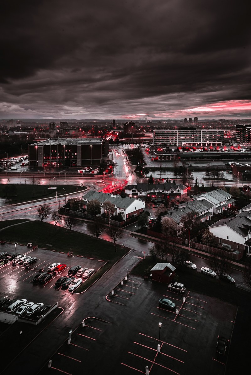 red lights in a town on a rainy evening, red lights in the rain 4k