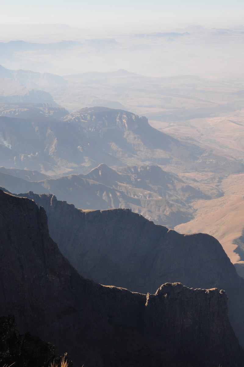 a breathtaking view of a dry mountain valley under a haze, summer haze over a mountain valley 4k