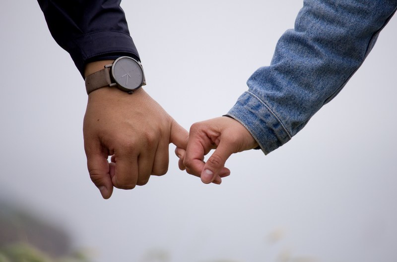 hand finger holding hand and watch 4k