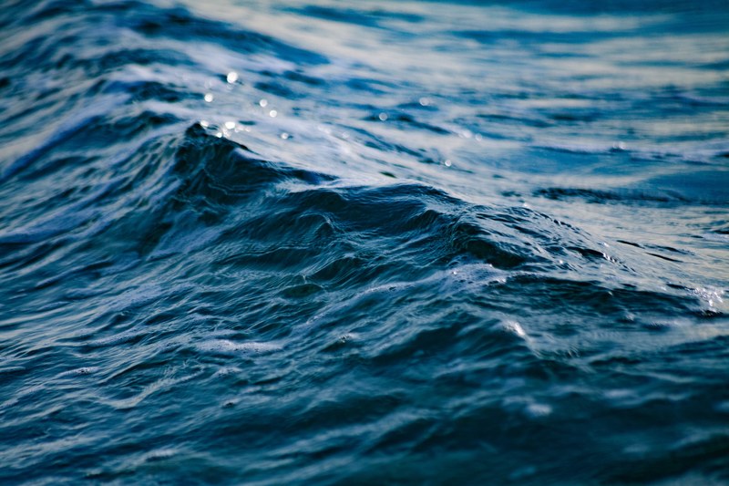 small wave in the blue ocean at miami beach, wave up close 4k