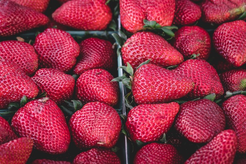 baskets of fresh red strawberries for sale at a produce market, collection of strawberry 4k