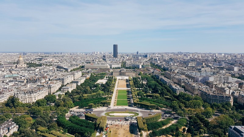 the view looking out from the eiffel tower in paris with montparnasse tower in the distance, eiffel tower view of montparnasse 4k