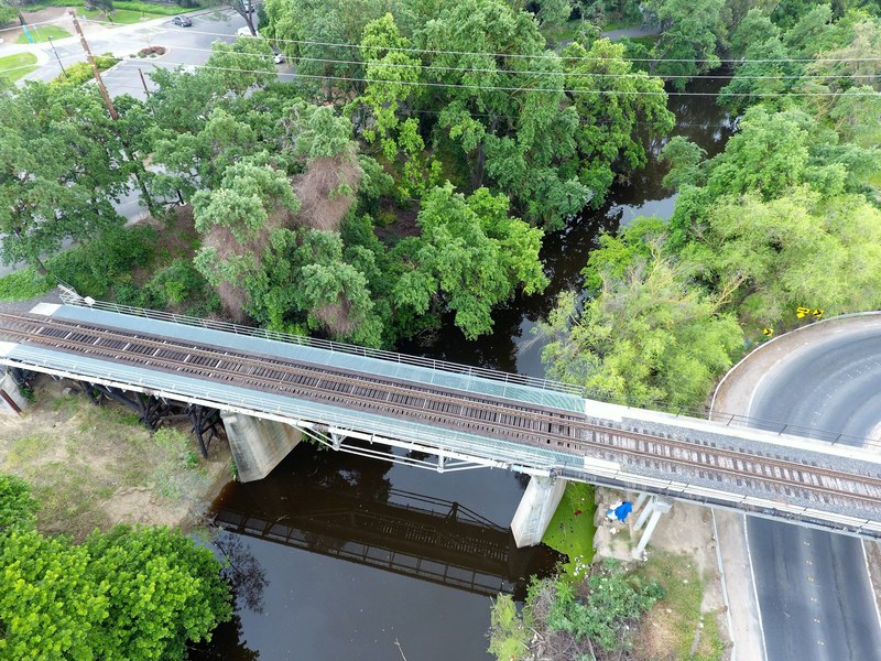 drone oblique aerial photo railroad and bridge 4k