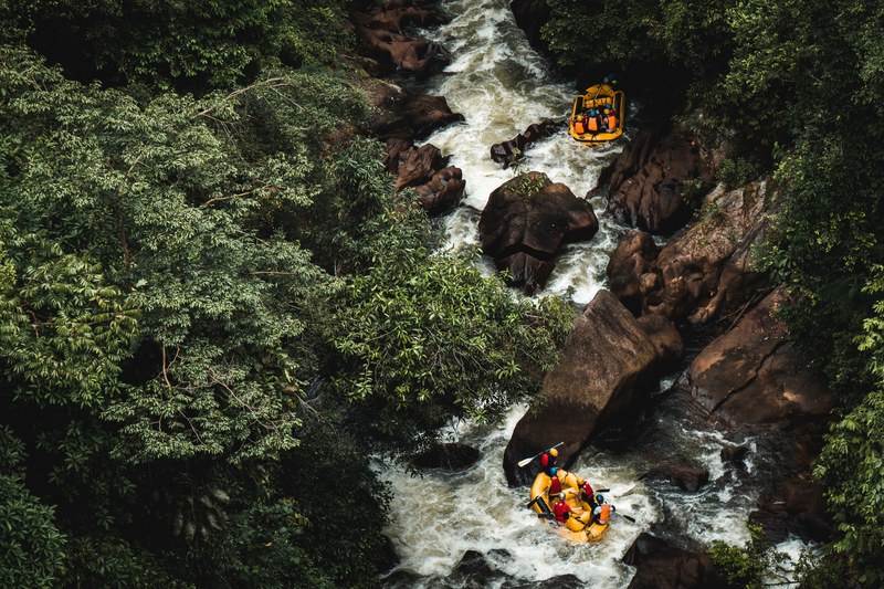 two teams enjoying white water rafting activities 4k