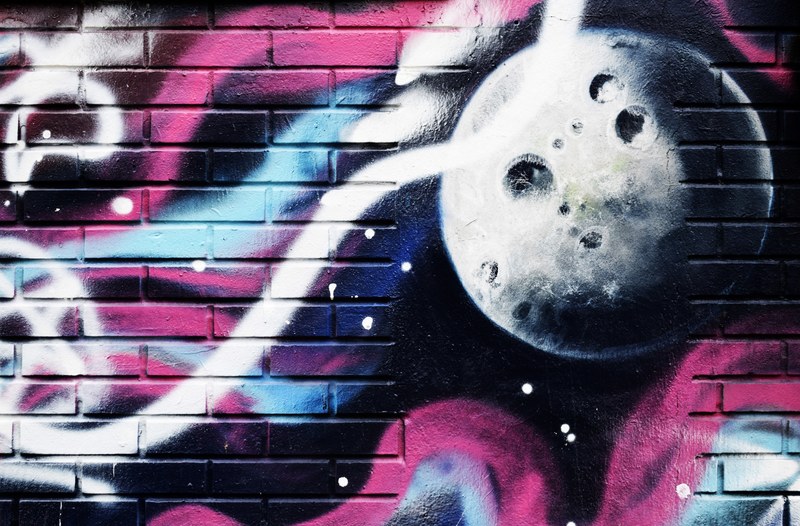 close up of colorful graffiti with moon graphic wall street art in a public place, colorful moon graffiti 4k