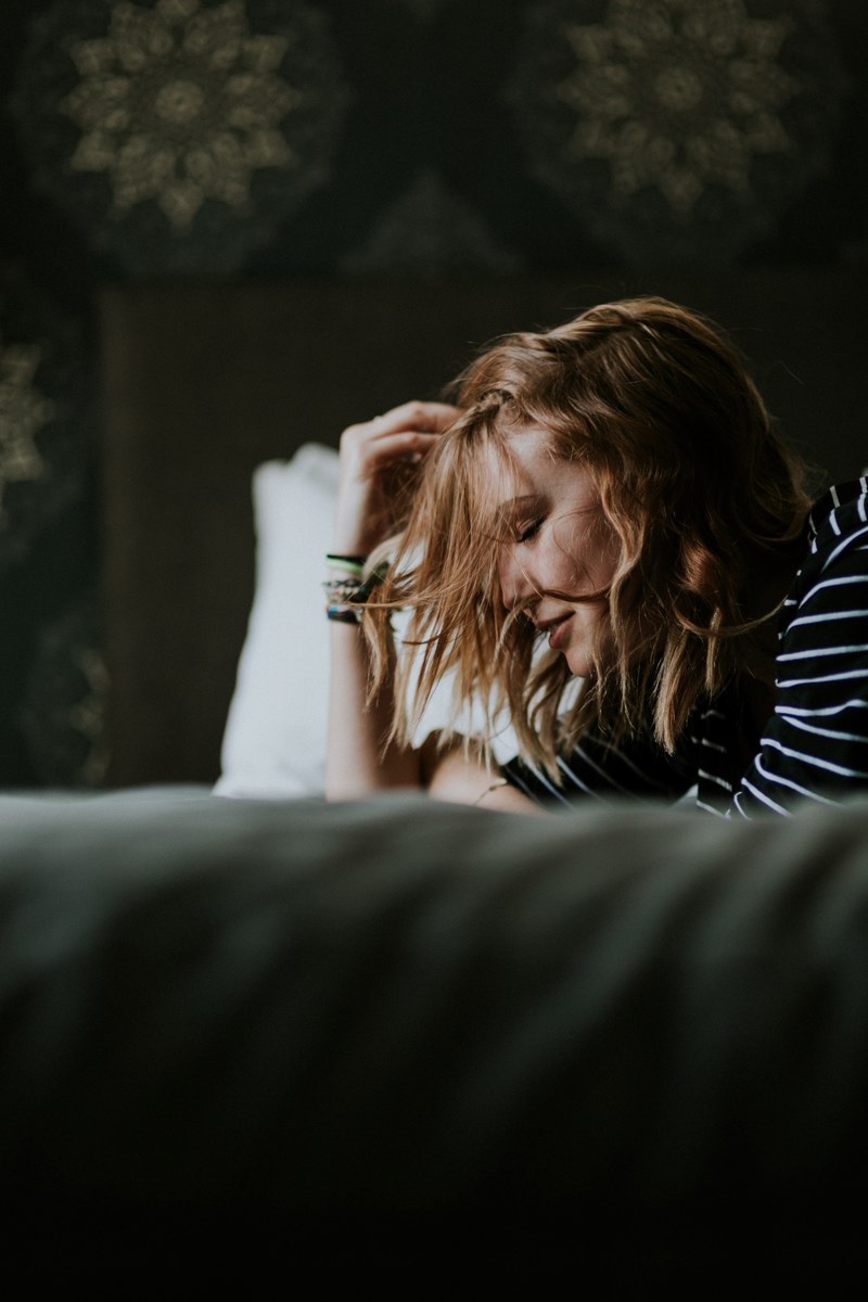 on bed woman touching hair and portrait hd, 4k
