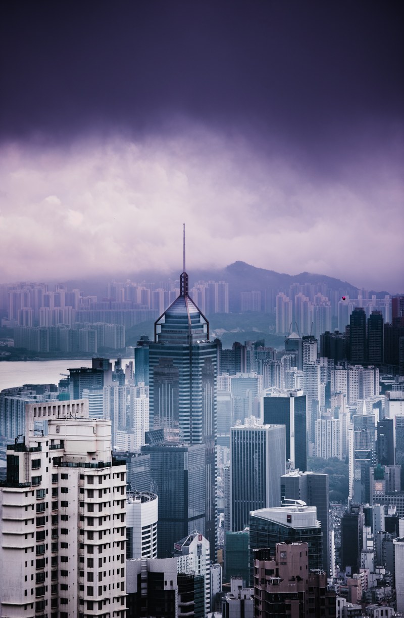 the skyline of hong kong under thick clouds, hong kong city 4k