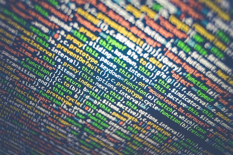 close up of colorful lines of code on a computer screen, colorful code 4k