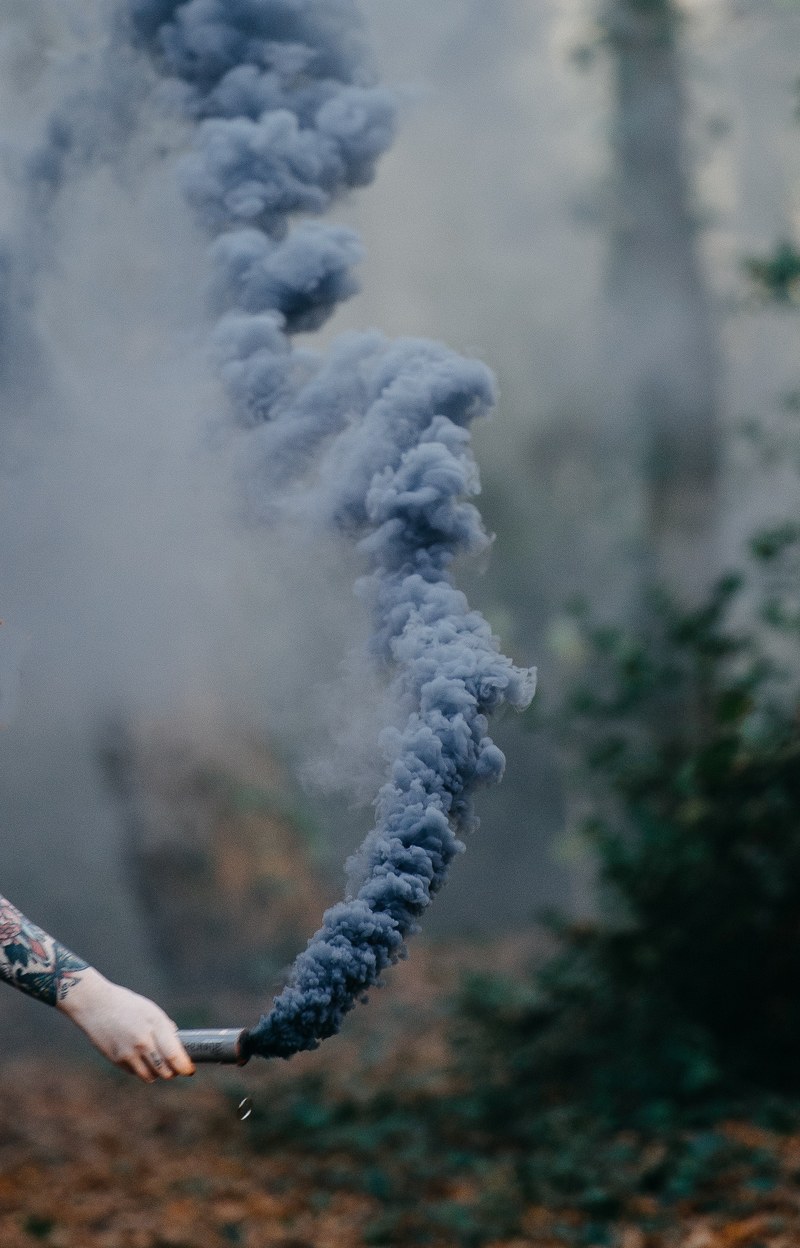 hand holding smoke grenade 4k