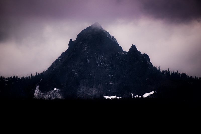 an overcast purple hued sky over the diamond peak, clouds gathering over diamond peak 4k