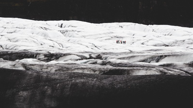 hikers explore snowy glacial landscapes in iceland, icelandic landscapes 4k