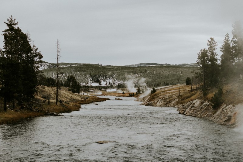 a river in yellowstone national park on a gray winter day, no river too wide 4k