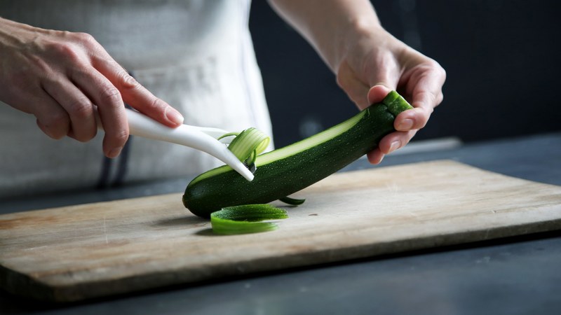 vegetable peeling zucchini and chopping board 4k