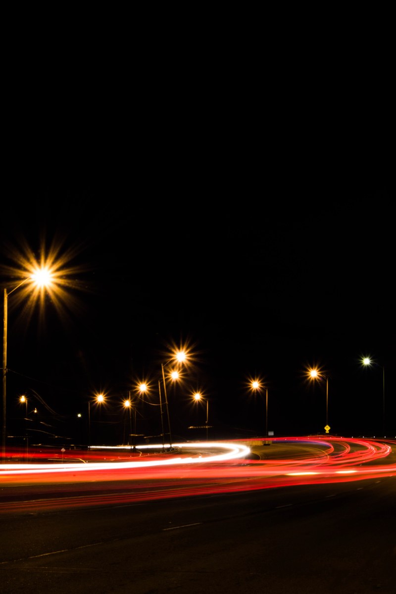 taillight and headlight light trails on a busy city street in toronto, toronto light trails at night 4k