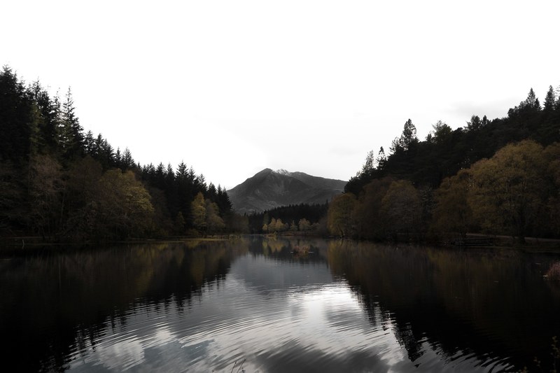 looking down a lake with trees on both sides and a mountain in the backdrop, _glencoe lochan reflections 4k