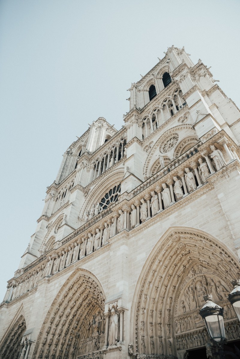 the gothic architecture and facade of notre dame cathedral in paris france, _notre dame view 4k