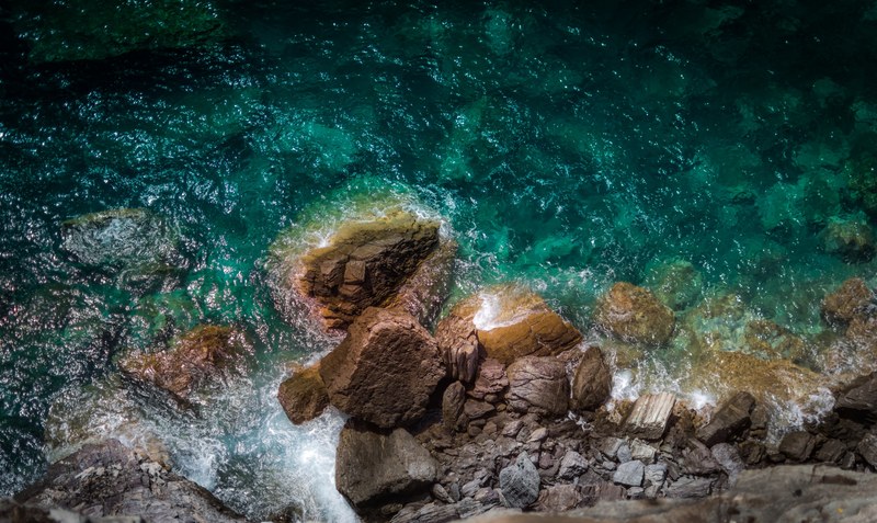 drone aerial view of a rocky coastline at skopelos, rocky coastline drone view 4k