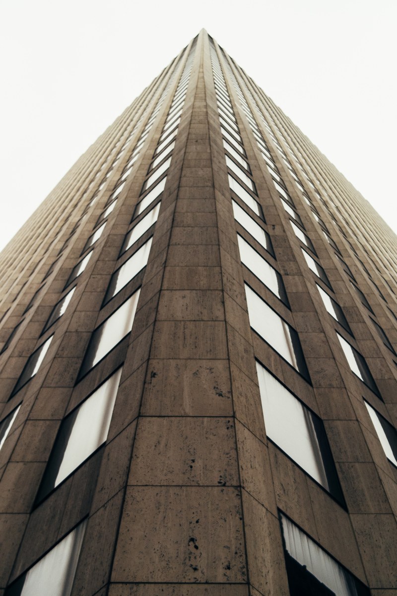 a low angle shot of a monumental high rise in new orleans, skyscraper in new orleans 4k