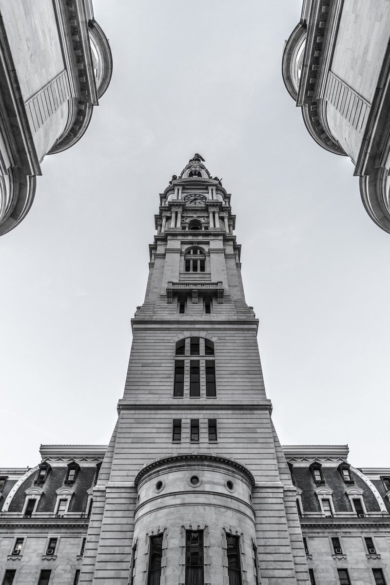black and white shot of large gothic building with tower and clear sky philadelphia city hall, city hall 4k