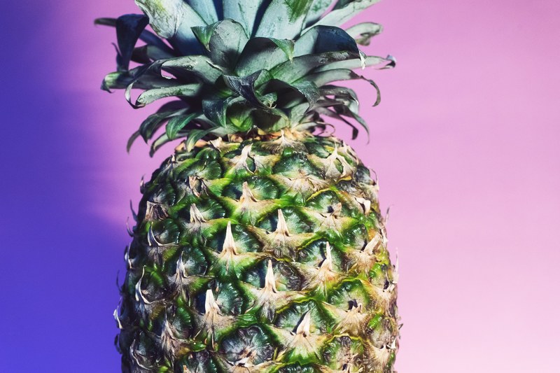 a pineapple against a purple and pink background, _pineapple top 4k
