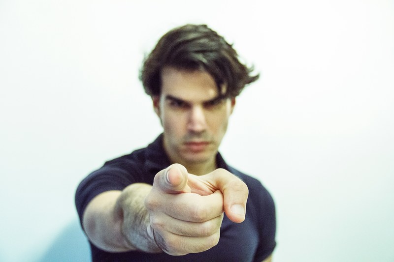 a man points his index finger directly at the camera, _pointing as you 4k