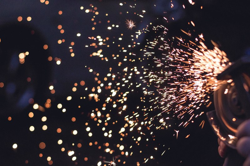 sparks flying off a grinder, _sparks 4k