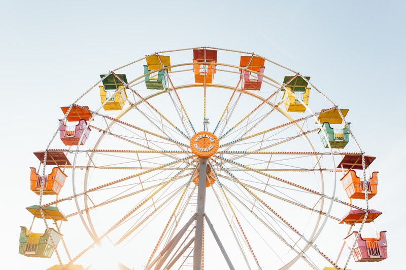 catch a colorful ride at the huge cleveland amusement park with ferriswheel at summer carnival, amusement park atcleveland in summer 4k