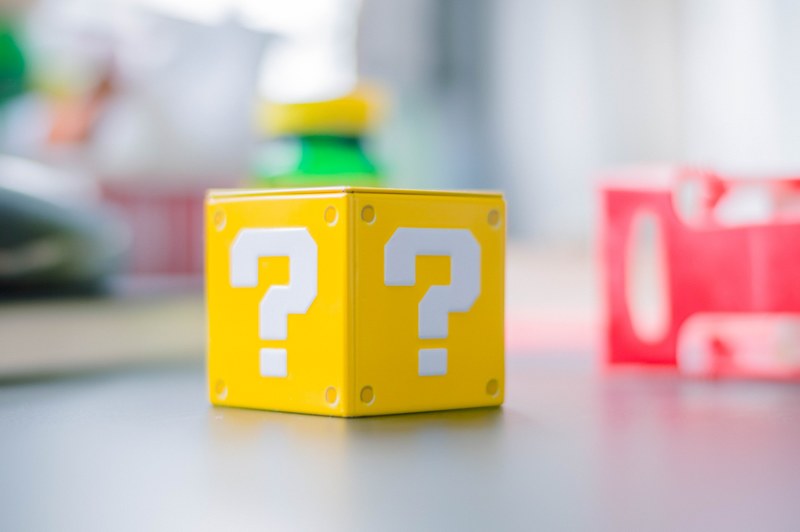 a blurred image of a yellow question mark box from mario, _blurred mario box 4k