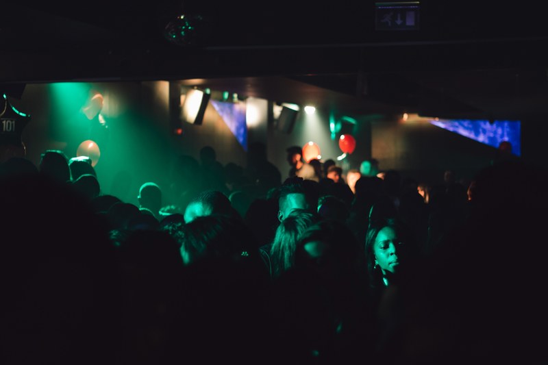 people dancing in a dark night club at the birmingham hippodrome in the united kingdom, old birmingham theater 4k