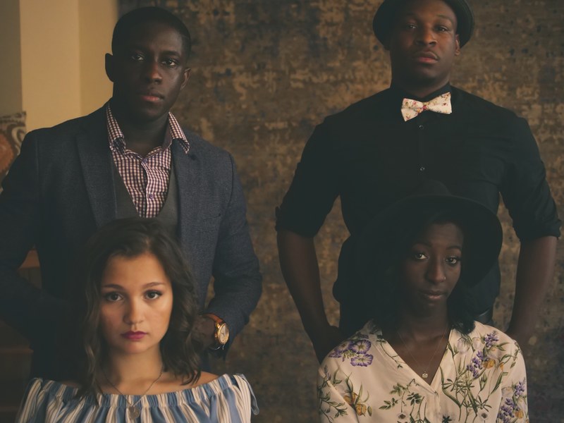 stoic portrait of a diverse group of people posing seriously, interracial and comfortable 4k