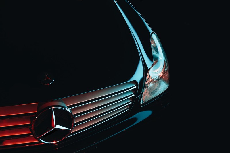 hood ornament and front bumper details on a black mercedes benz, mercedes detailed reflections 4k
