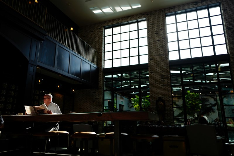 man sitting and reading the newspaper, _man reading newspaper 4k