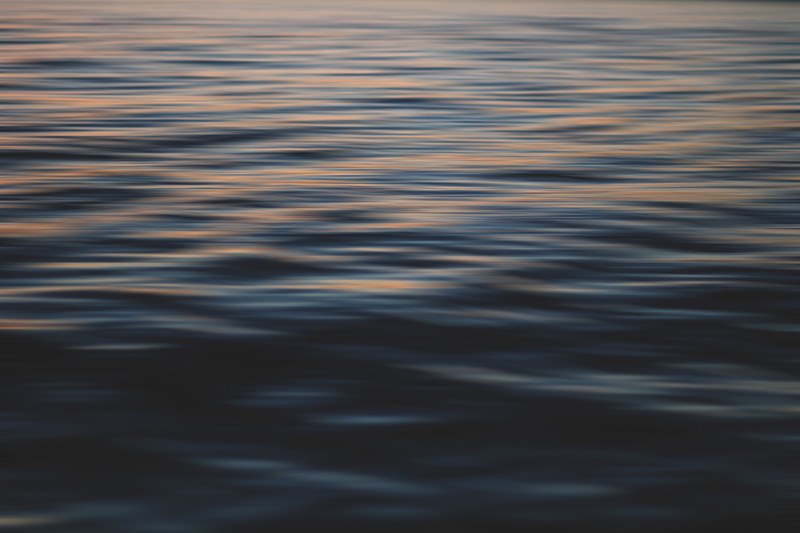 a photograph of a calm wavy water surface, _calm wavy water surface 4k